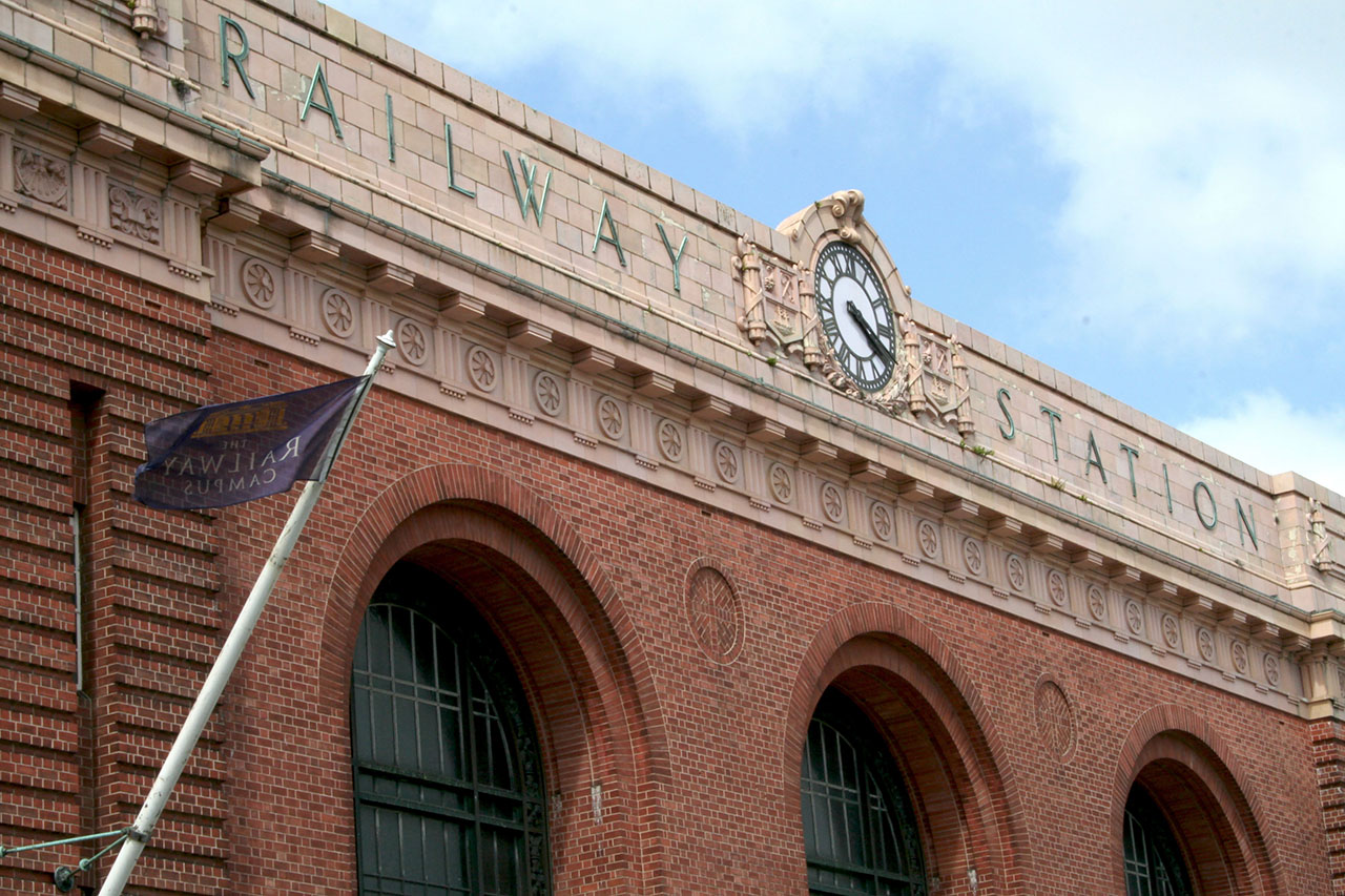 Brick arches and the clock on Auckland’s Old Railway Station